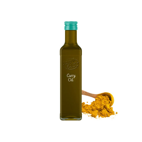 Fresh curry powder beside a bottle labeled "Curry Oil" of curry oil.