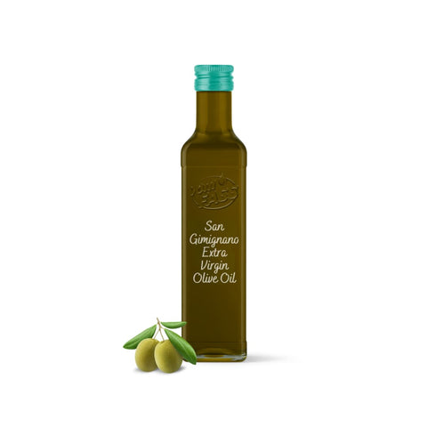 Extra virgin olive oil in a dark green bottle with a teal cap, featuring a "San Gimignano" label, next to fresh green olives.