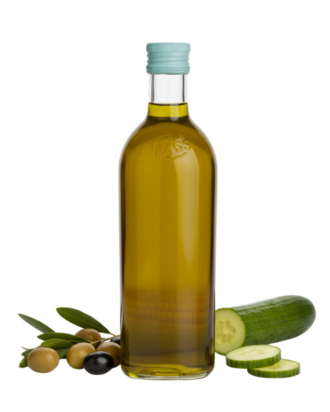 Bottle of olive oil with cucumbers and olives on a white background